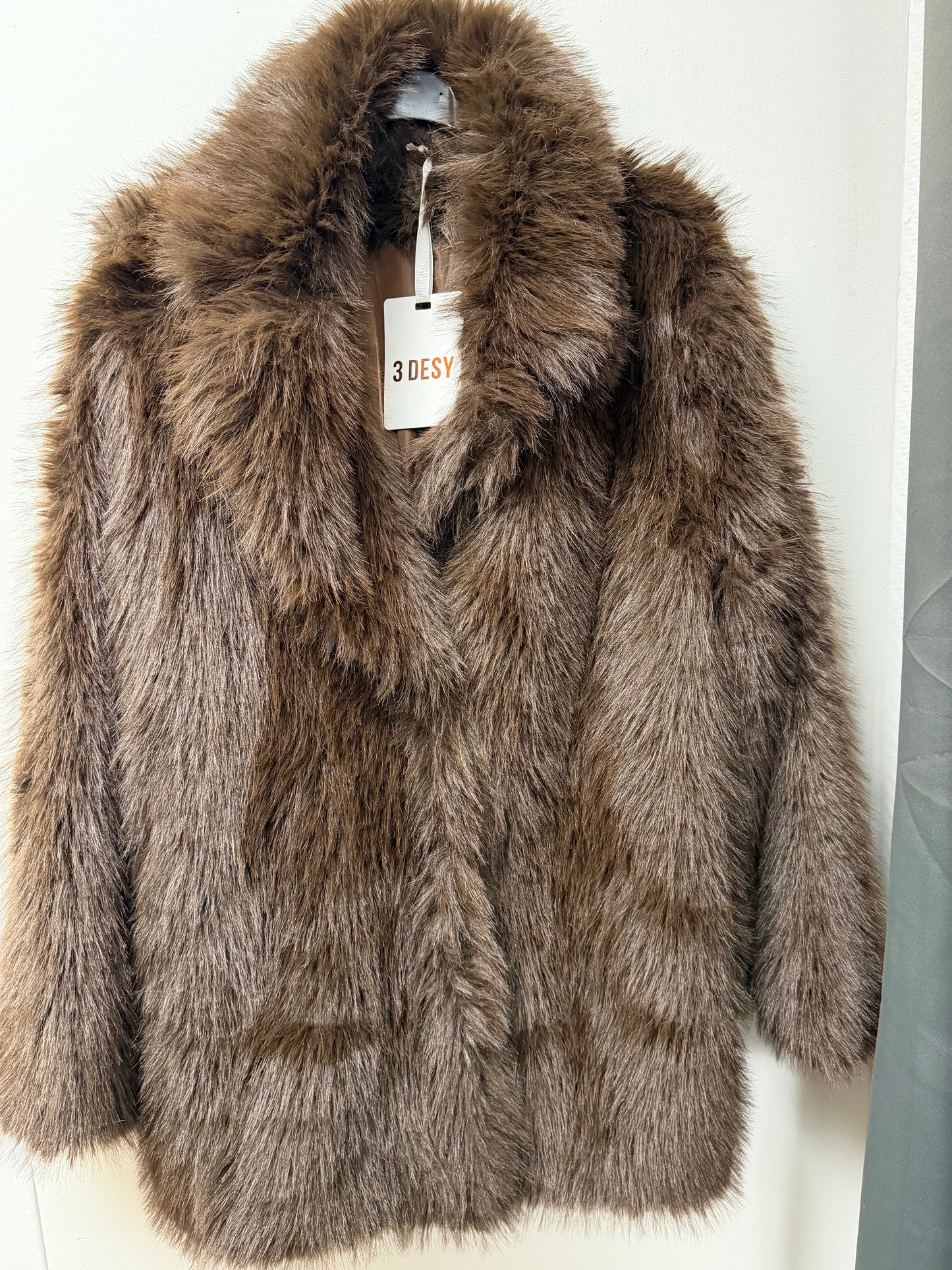 Manteau en fausse fourrure