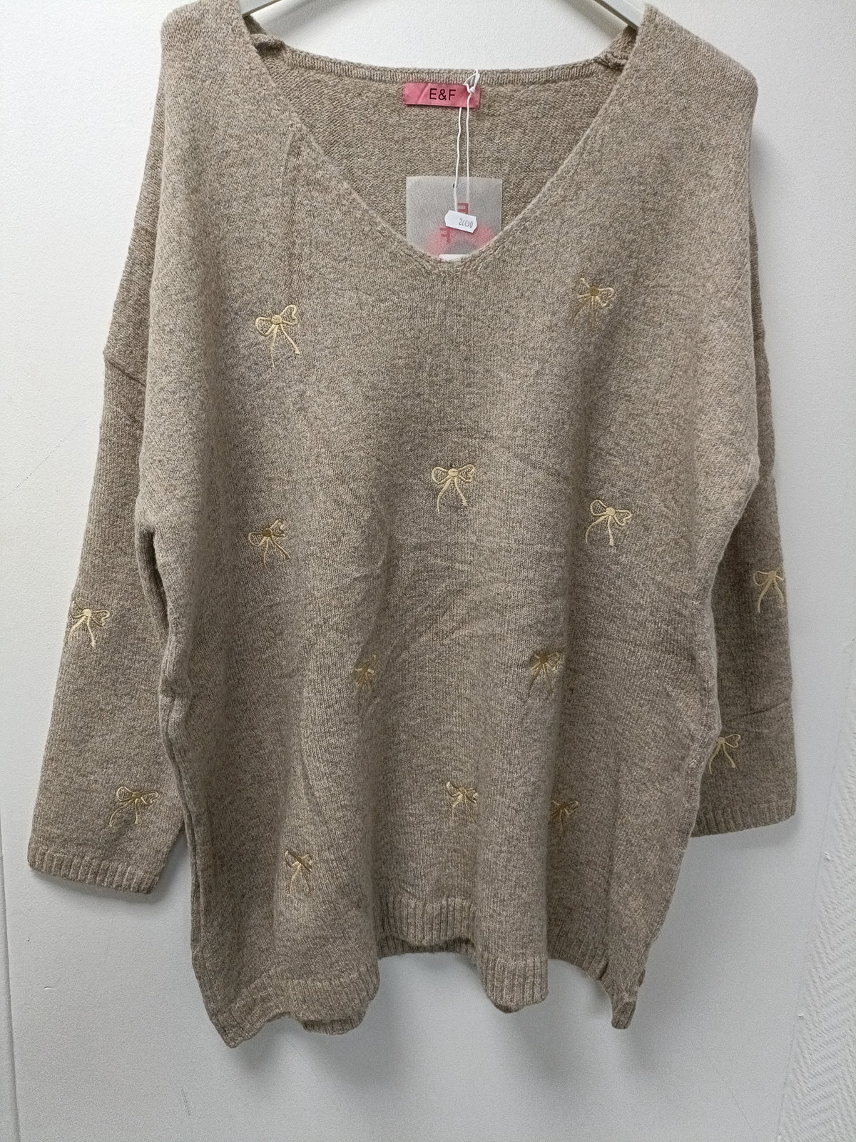 Pull imprimé nœud papillon