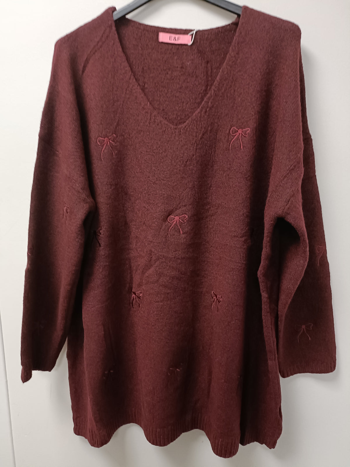 Pull imprimé nœud papillon