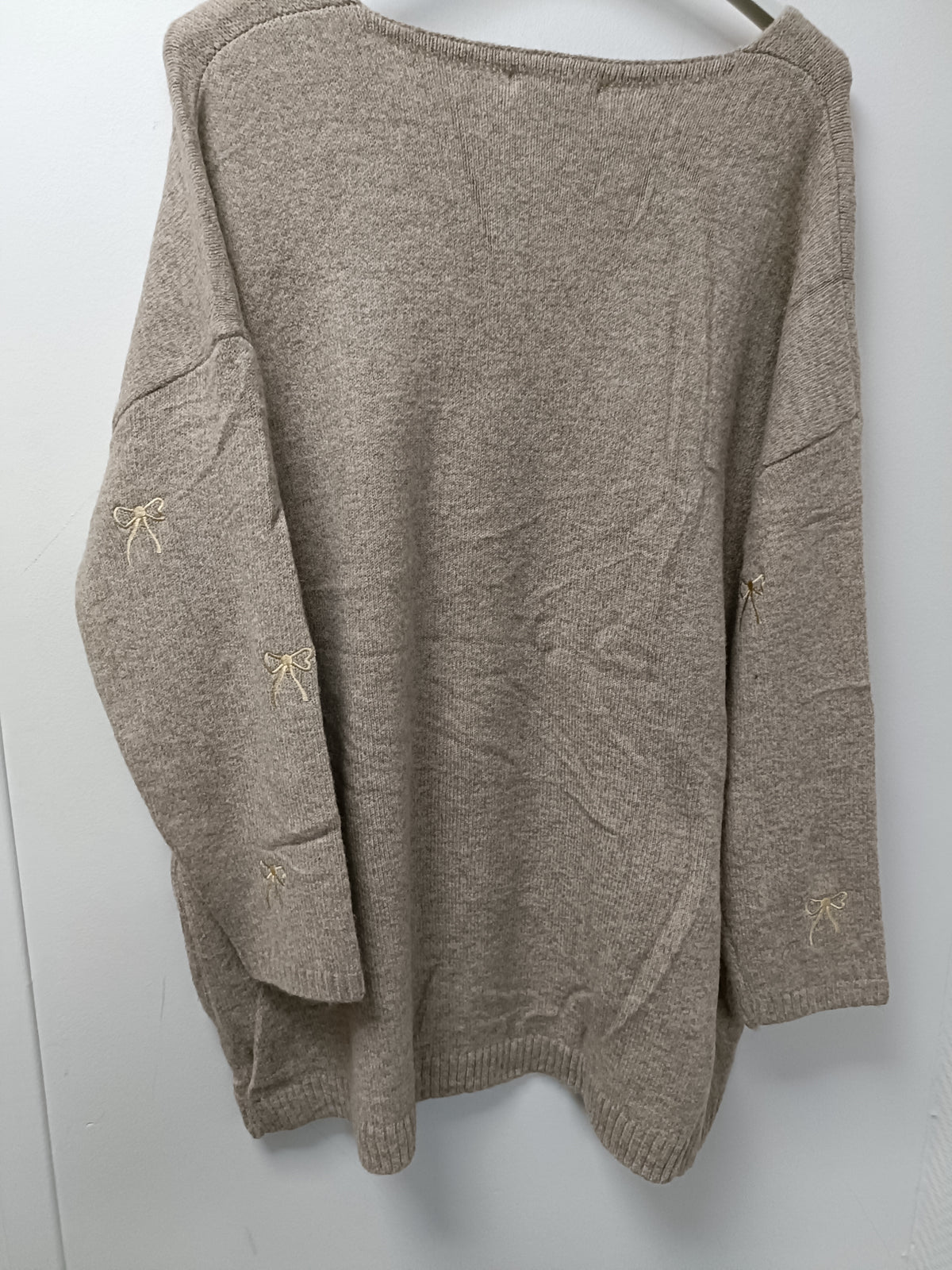 Pull imprimé nœud papillon