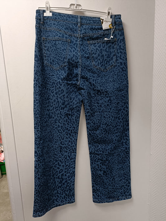 Superbe jeans bleu façon léopard