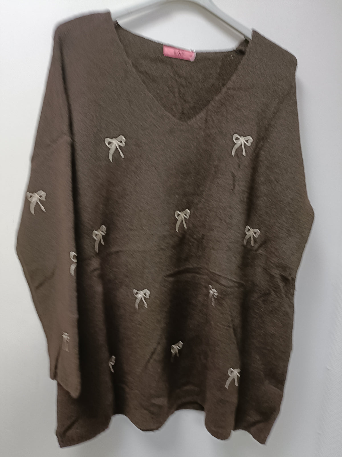 Pull imprimé nœud papillon
